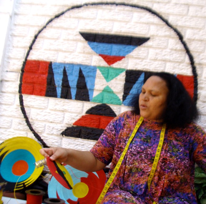 Hlengi considering her work b